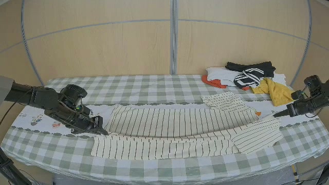 Both R1Lite grippers folding a striped garment during a RW-RL-HIL episode; still extracted at 45 seconds from episode 000001, BodenAI, CC BY 4.0